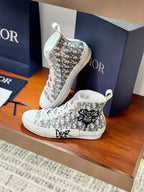 Dior ladies high-top sneakers, white with black monogram print, angled pair
