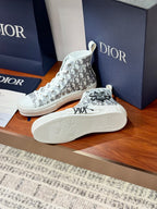 Dior ladies high-top sneakers, white with black monogram print, visible outsole