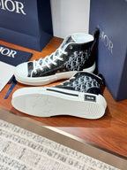 Side view high-top Dior sneakers with black monogram upper and white rubber sole