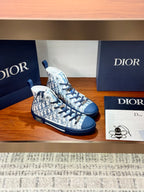 High-top sneakers with blue laces and Dior monogram print, side angle