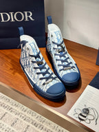 Pair of high-top sneakers with blue and white Dior monogram, close view