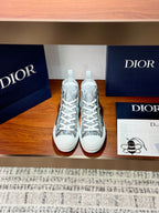 Gray Dior high-top sneakers with geometric monogram pattern and white laces