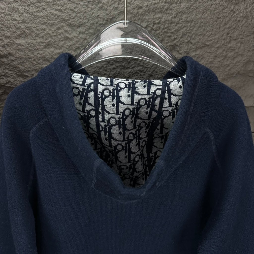 Dior long hoodie hood close-up with dark navy cowl and patterned inner lining