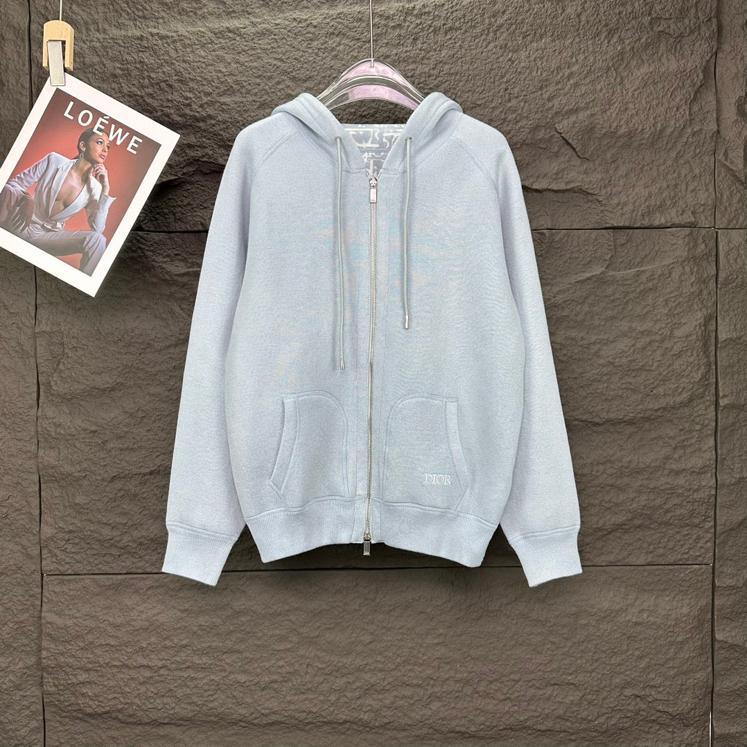 Light blue Dior zip-up hoodie with drawstring hood and front pockets