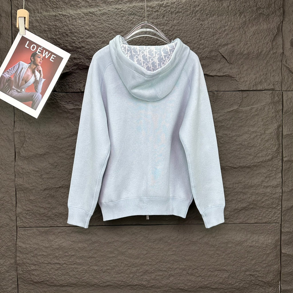 Light blue Dior zip-up hoodie with hood and long sleeves, back view