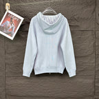 Light blue Dior zip-up hoodie with hood and long sleeves, back view