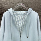 Light blue Dior zip-up hoodie close-up of hood lining and zipper area