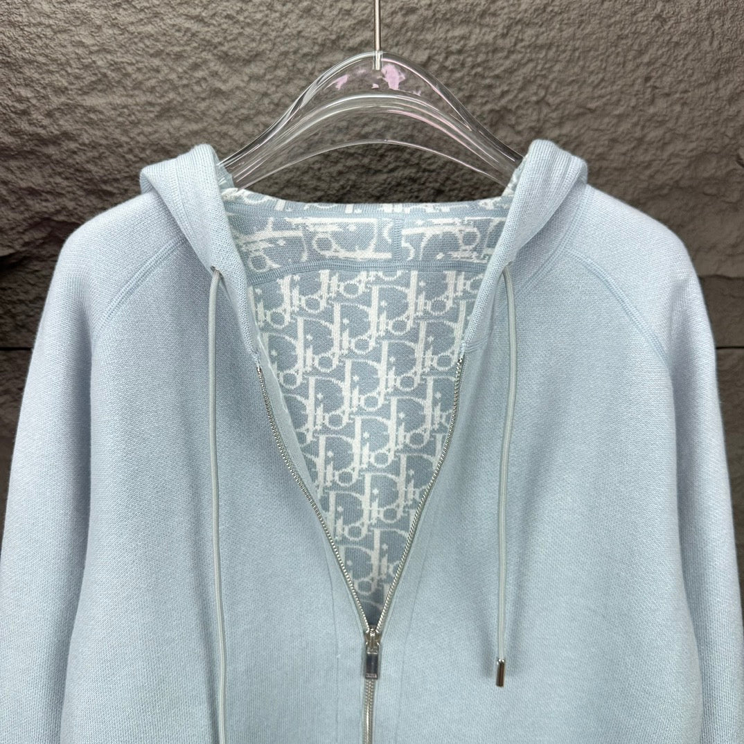 Light blue Dior zip-up hoodie close-up of hood lining and zipper area