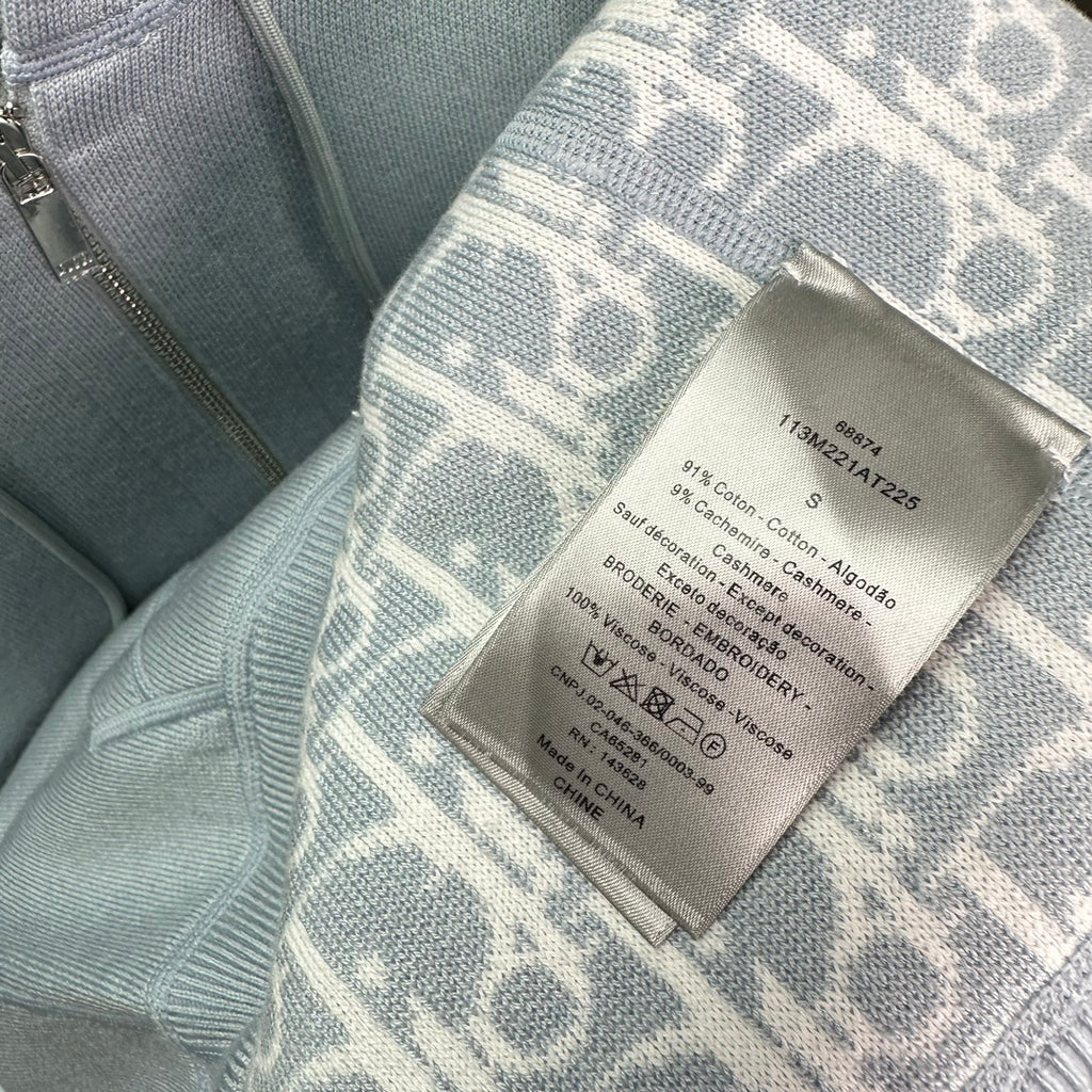 Light blue Dior hoodie fabric and care label attached to the lining