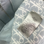Light blue Dior hoodie fabric and care label attached to the lining