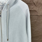 Light blue Dior zip-up hoodie sleeve and side of front zipper