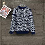 Navy Dior knit zip hoodie with allover white monogram pattern and logo stripe