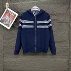 Navy Dior knit zip hoodie with white striped bands and ribbed cuffs