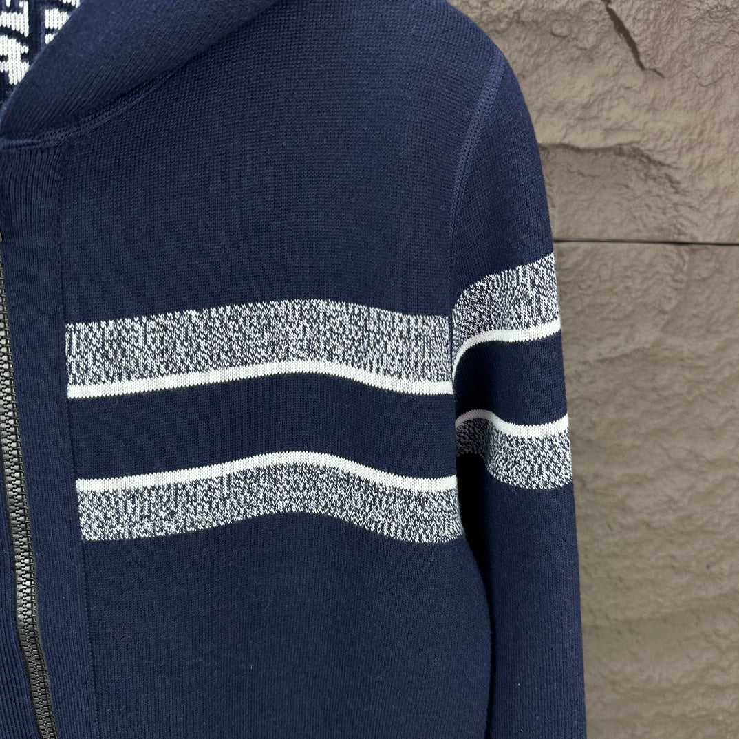 Navy zip hoodie with wide white horizontal stripe on sleeves and body