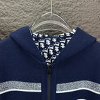Navy zip hoodie hood with patterned lining and central metal zipper