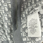 Dior care label on a gray zip hoodie collar