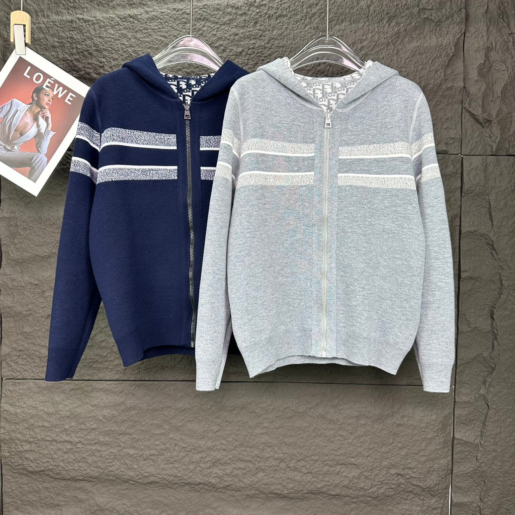 Dior zip hoodies in navy and light gray, each with striped chest bands
