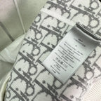 Dior hoodie care label with size and fabric composition tag