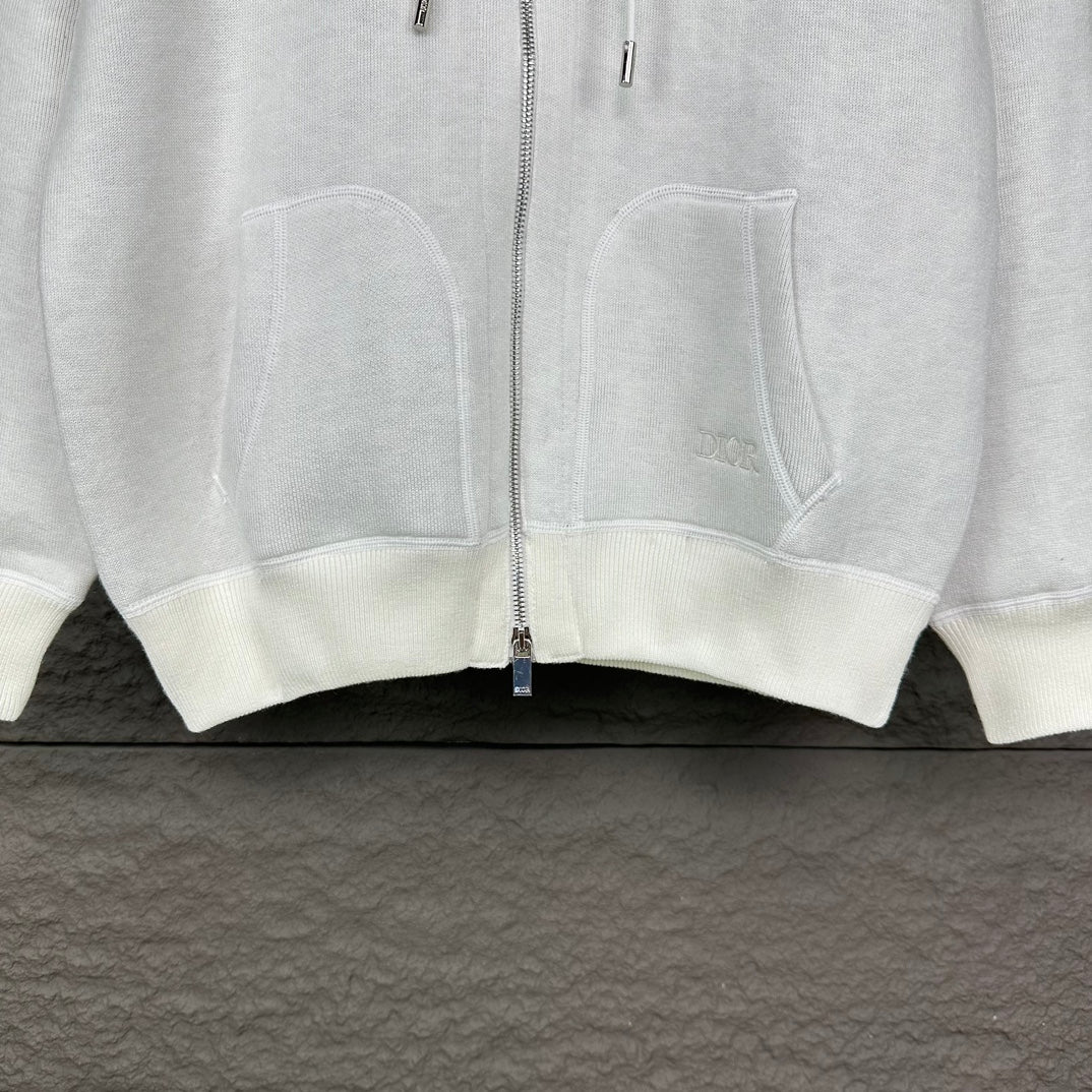 Dior white zip-up hoodie with two front pockets and exposed zipper