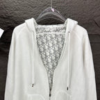 Dior white hoodie interior lining with jacquard-style logo pattern