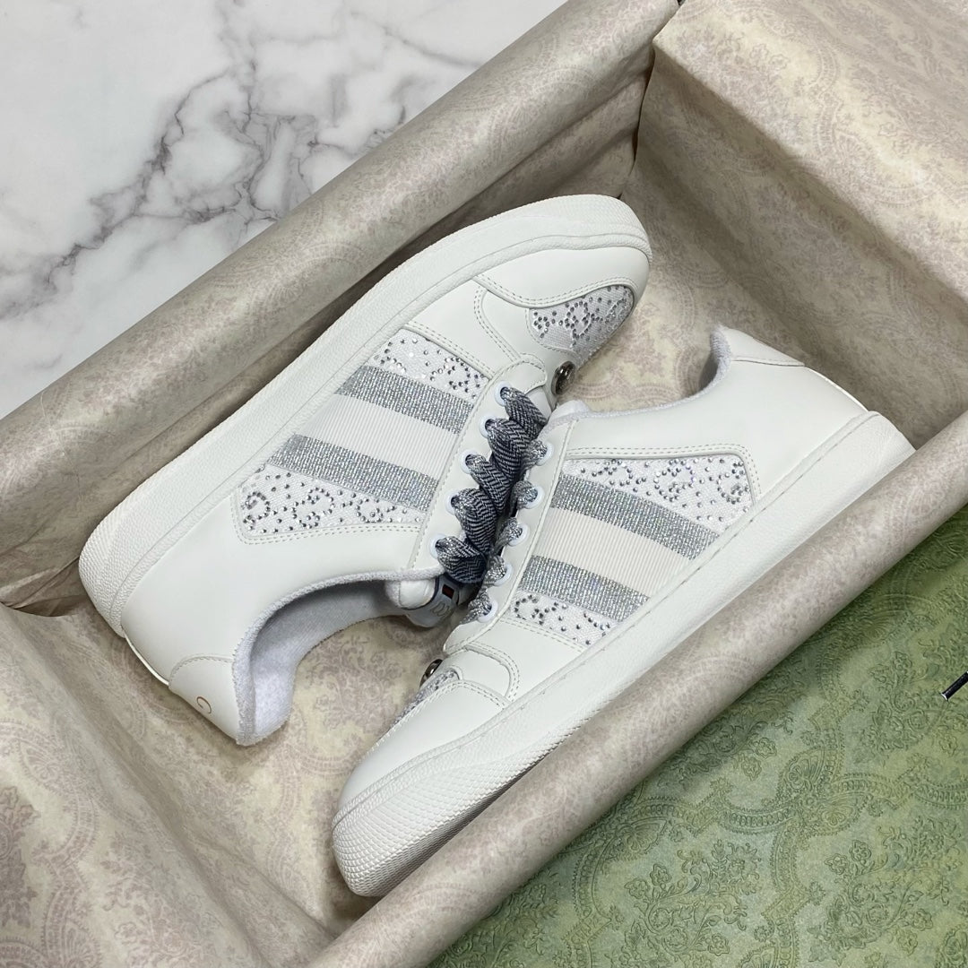 White Gucci unisex sneakers with gray stripe and perforated toe panel
