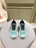 Mint and black lace-up sneakers with white sole and Dior logo on tongue
