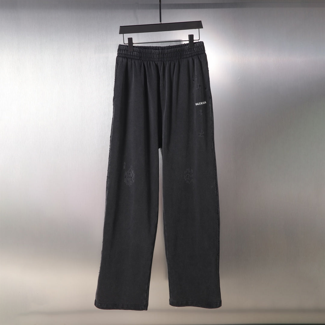 Black Balenciaga wide-leg pants with elastic waistband