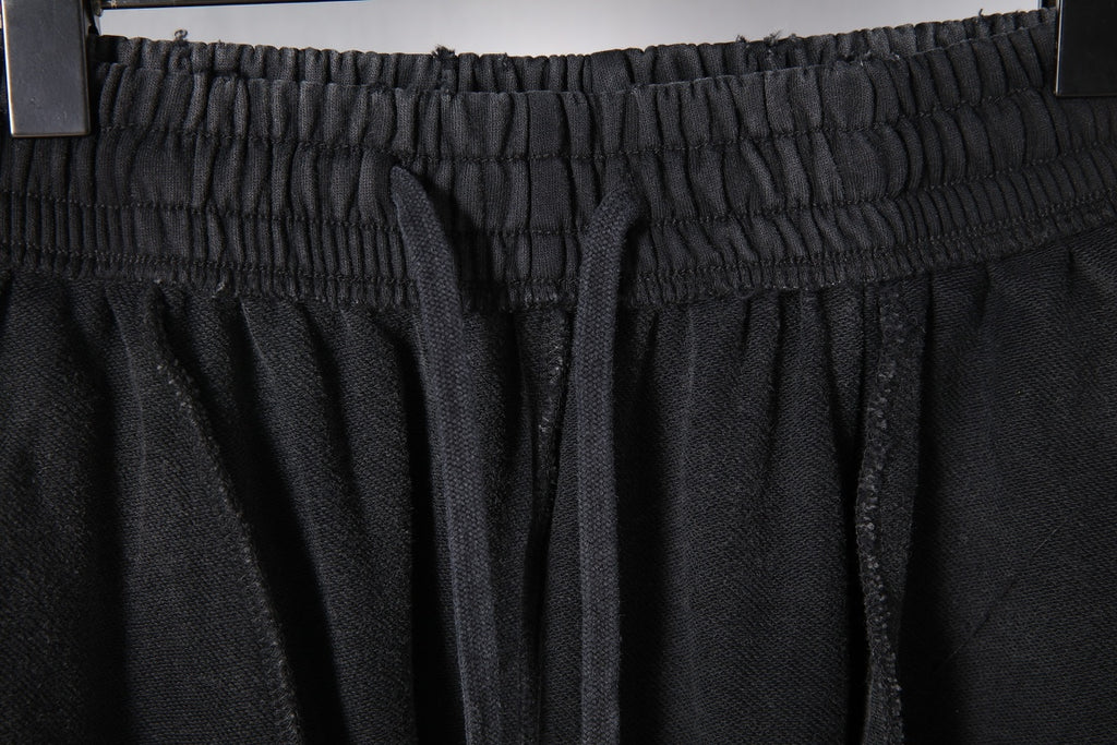 Black Balenciaga pants waist with gathered elastic and front pleats
