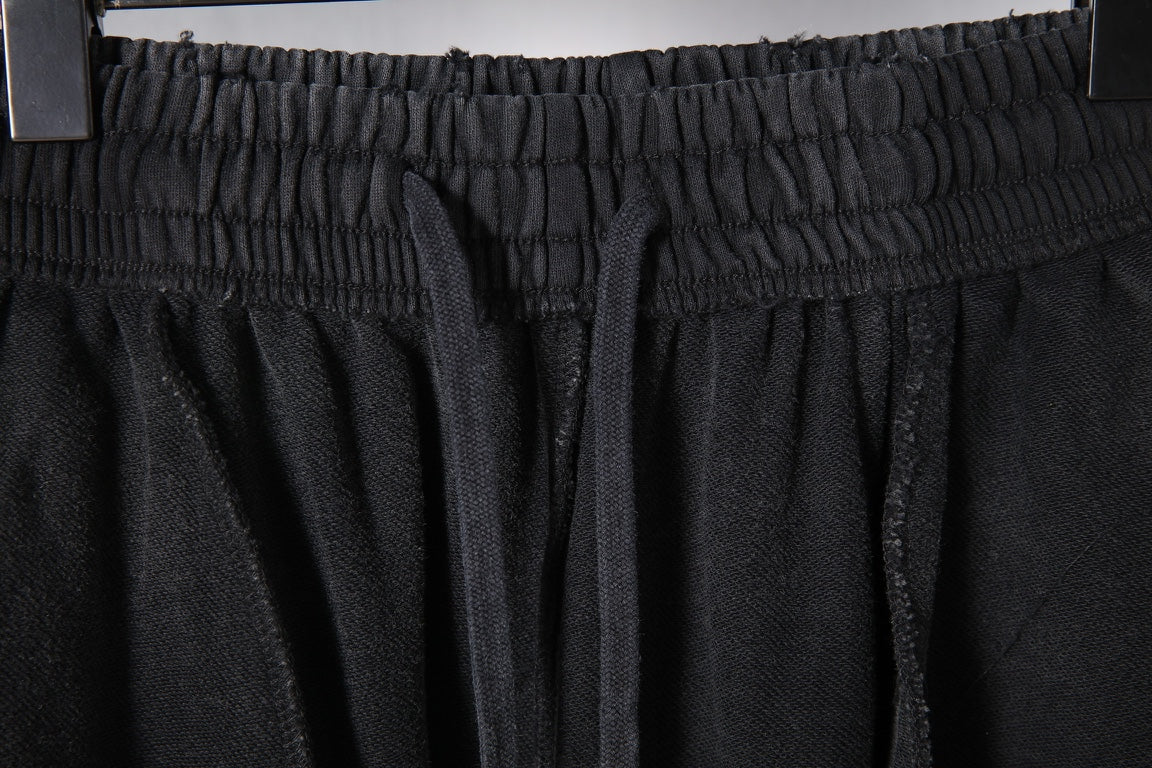 Black Balenciaga pants waist with gathered elastic and front pleats