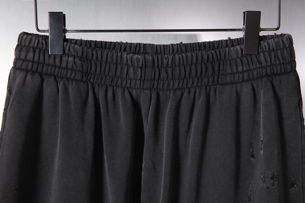 Black Balenciaga pants with gathered elastic waistband