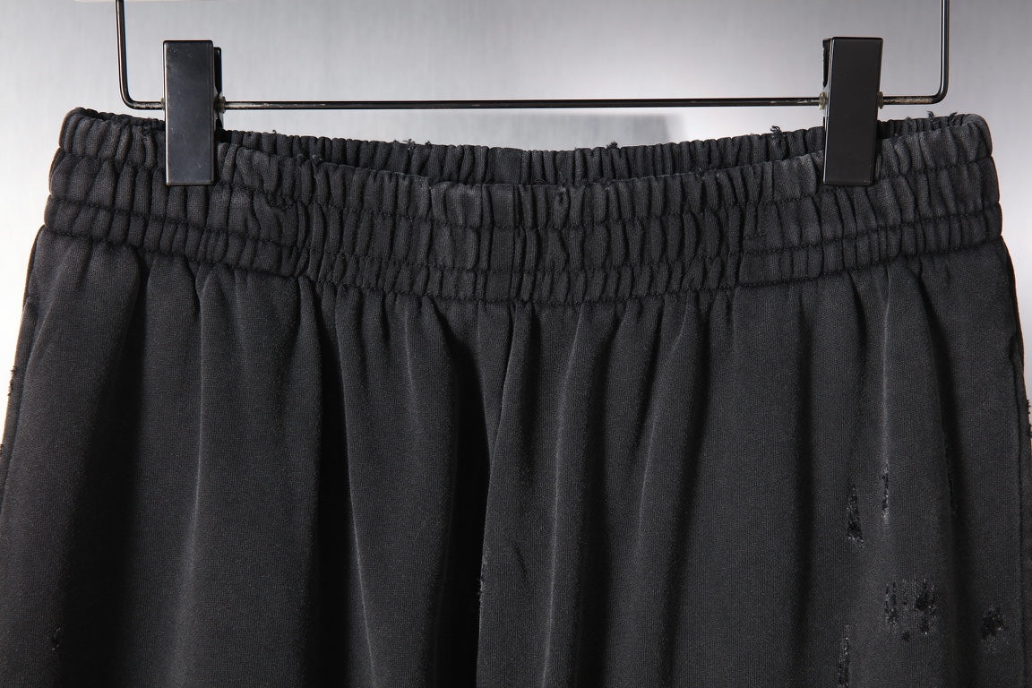 Black Balenciaga pants with gathered elastic waistband