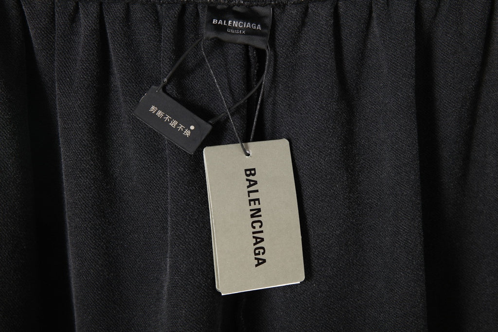 Black Balenciaga pants with hanging size and brand tags