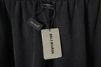 Black Balenciaga pants with hanging size and brand tags