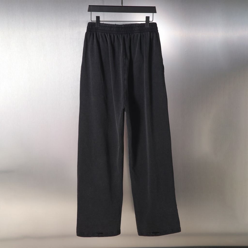 Black Balenciaga wide-leg pants, full front view