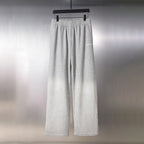 Balenciaga light gray sweatpants with elastic waist and wide straight legs