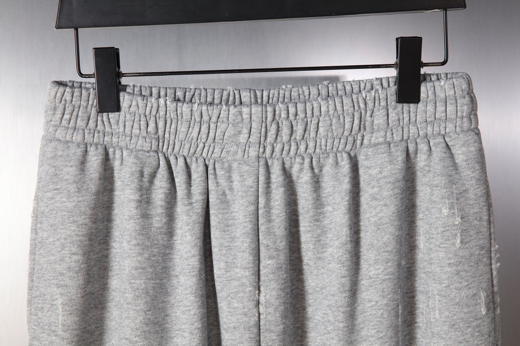 Balenciaga gray pants on hanger with gathered elastic waist