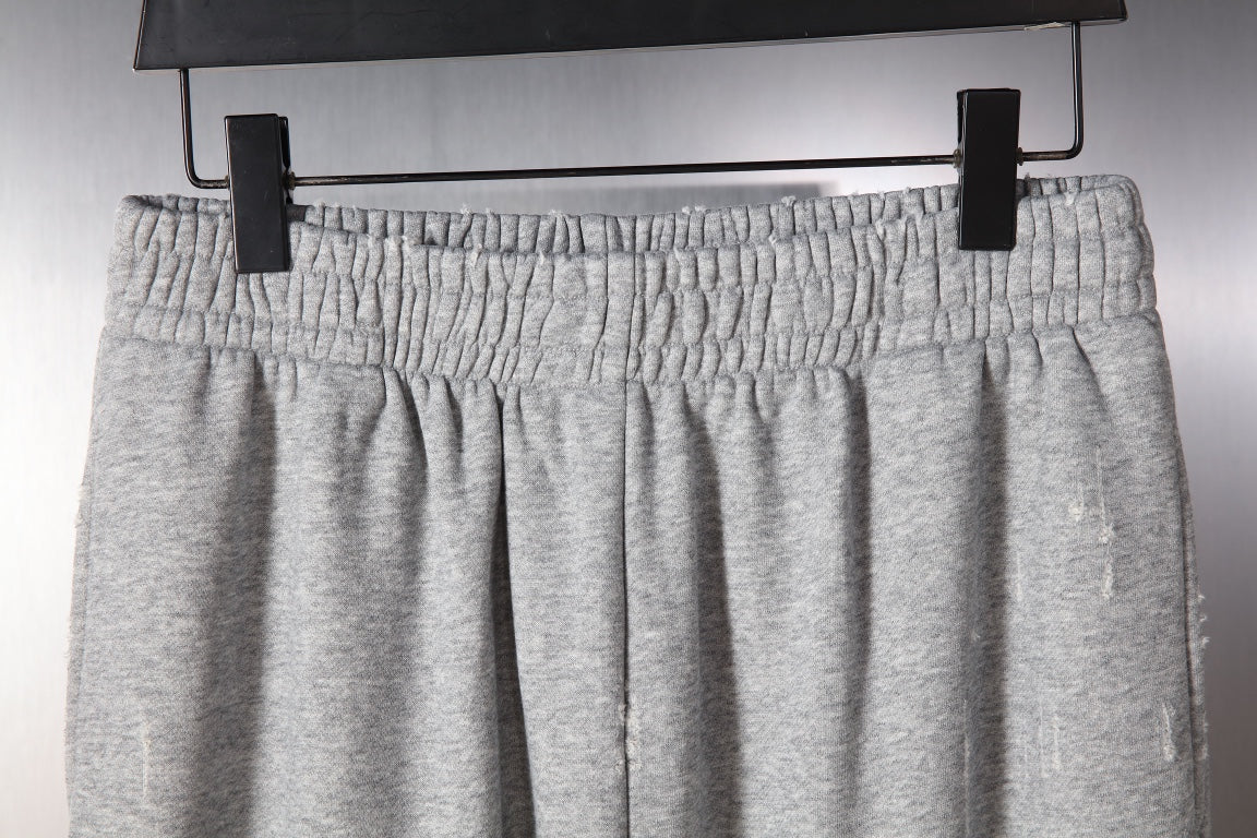 Balenciaga gray pants on hanger with gathered elastic waist