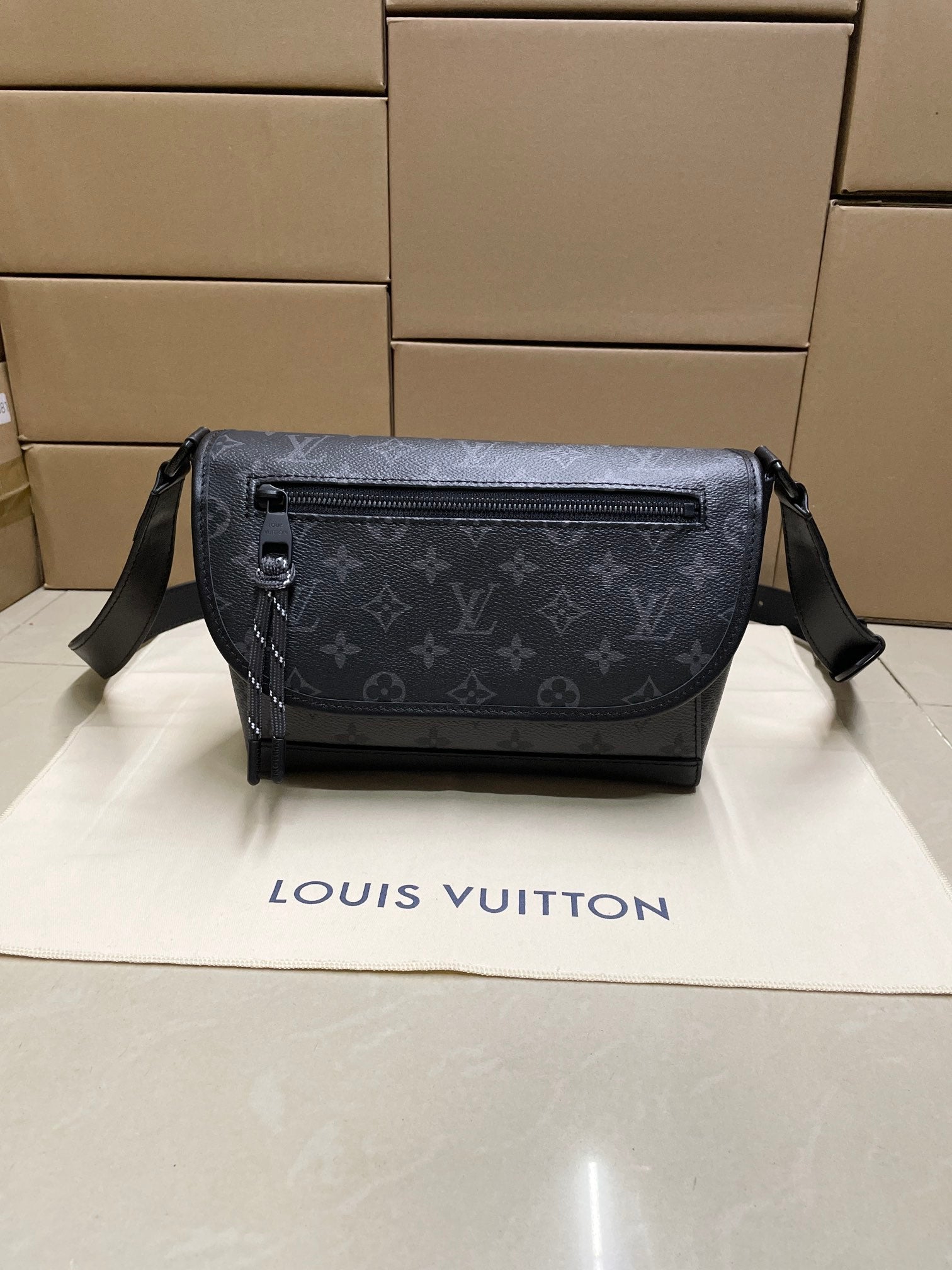 Louis Vuitton men's crossbody bag in blue monogram canvas, front view