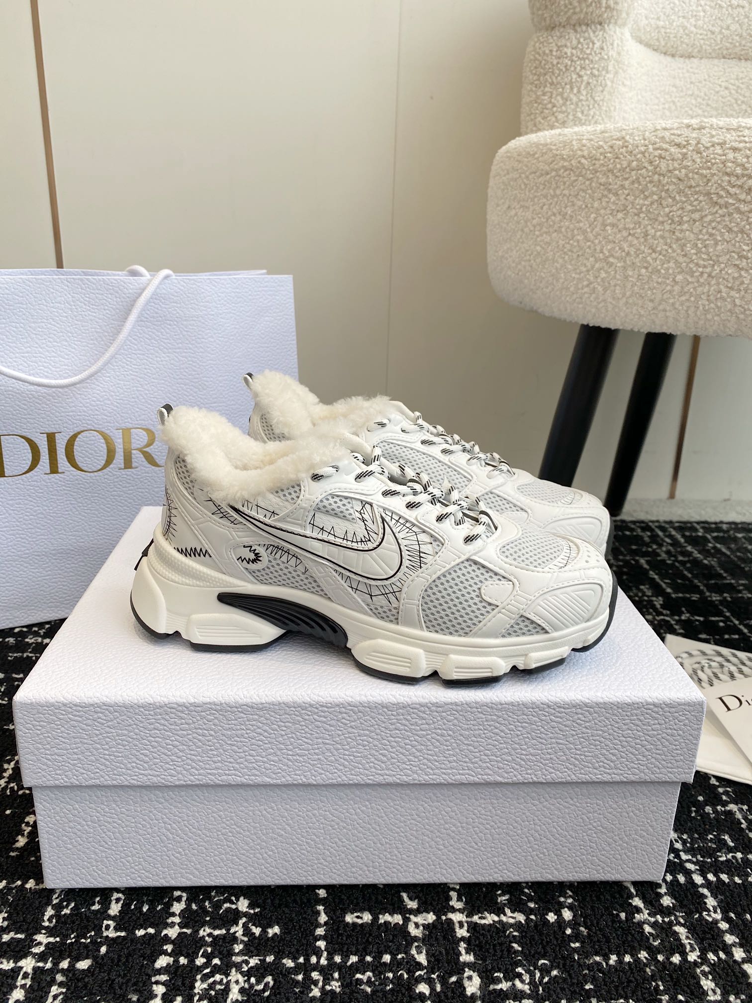 Dior unisex sneakers, white mesh upper with lace-up closure and thick rubber sole.