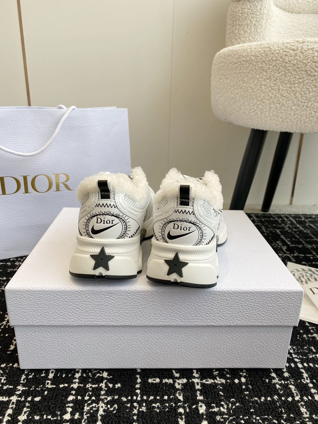 Dior unisex sneakers in white with star-shaped heel detail and Dior heel tabs.