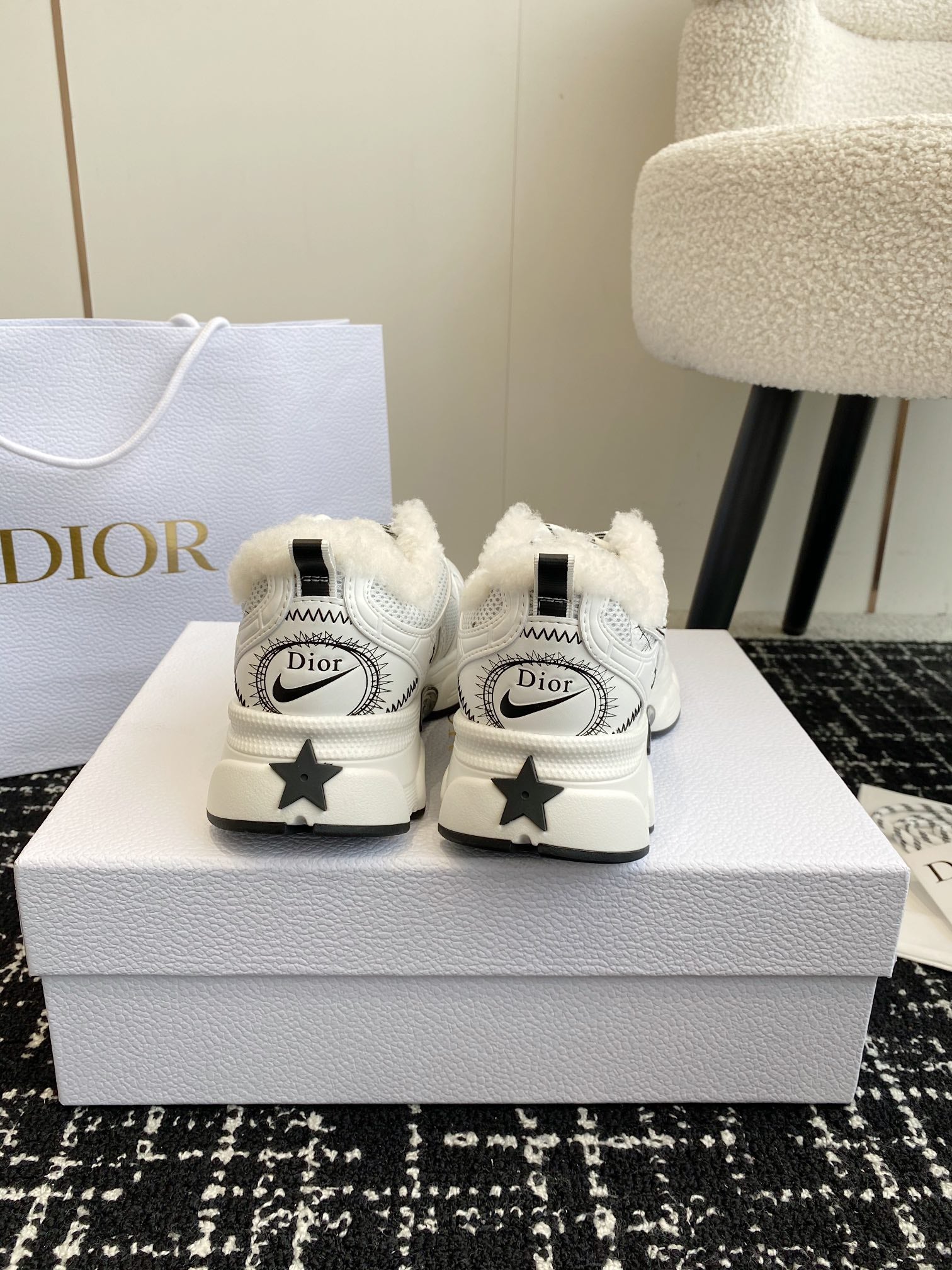 Dior unisex sneakers in white with star-shaped heel detail and Dior heel tabs.