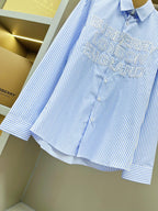 Light blue striped Burberry button-up shirt with rear logo print