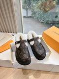 Louis Vuitton monogram loafers with white shearling lining and buckle strap
