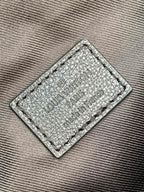 Louis Vuitton monogram bag leather logo patch with printed text