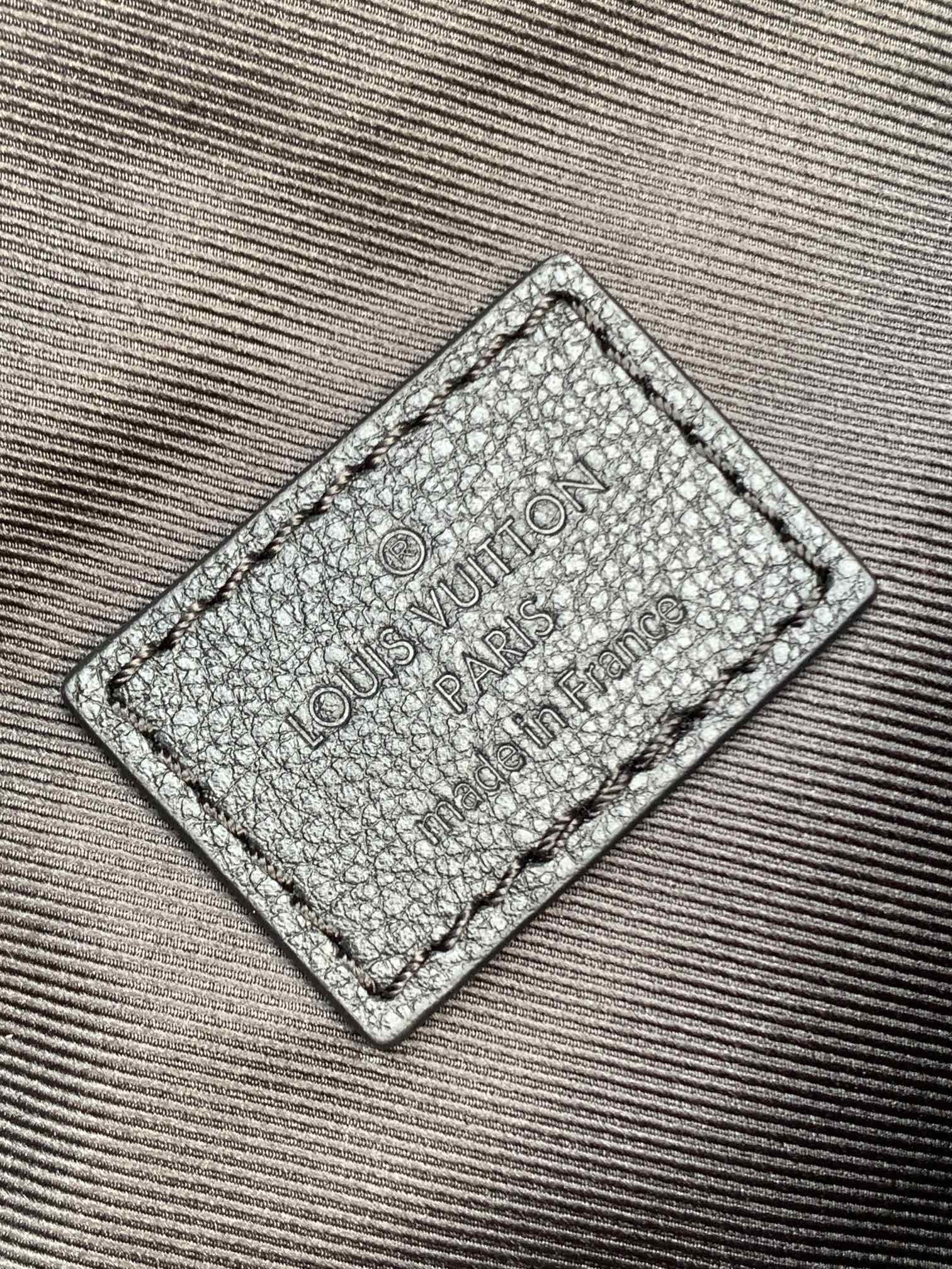 Louis Vuitton monogram bag leather logo patch with printed text