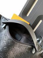 Louis Vuitton monogram crossbody bag open interior with zip pocket and dark lining