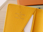 Yellow Louis Vuitton monogram small wallet/card holder inner panel close-up