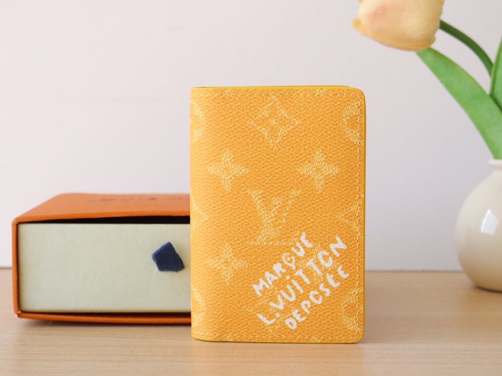 Yellow Louis Vuitton monogram small wallet/card holder front view