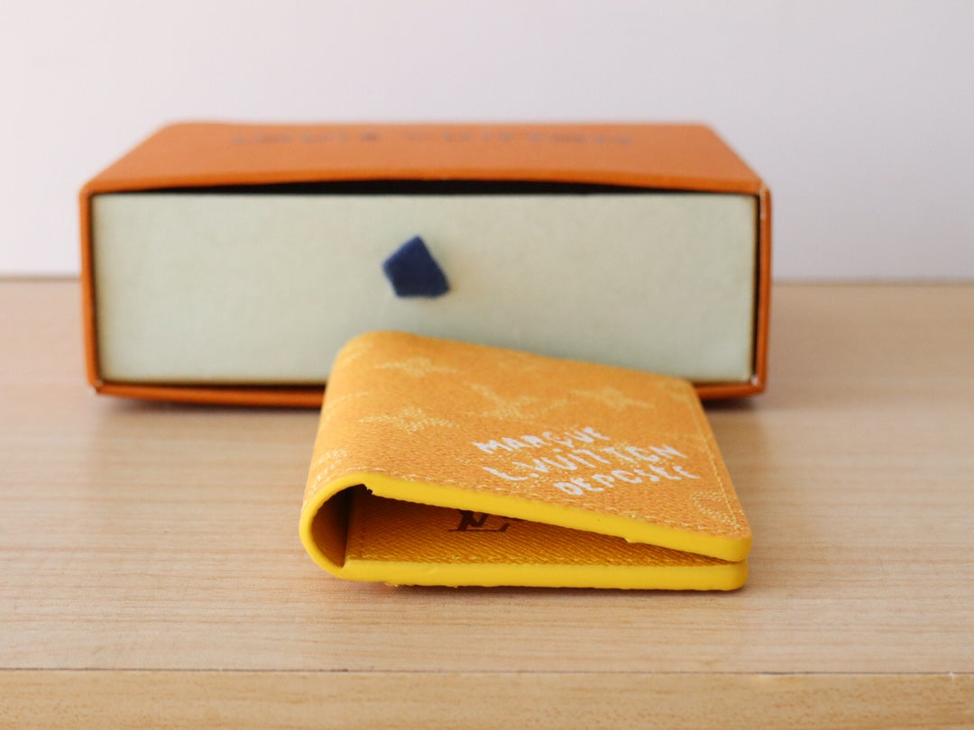 Yellow Louis Vuitton monogram small wallet/card holder opening view
