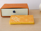 Yellow Louis Vuitton monogram small wallet/card holder back view